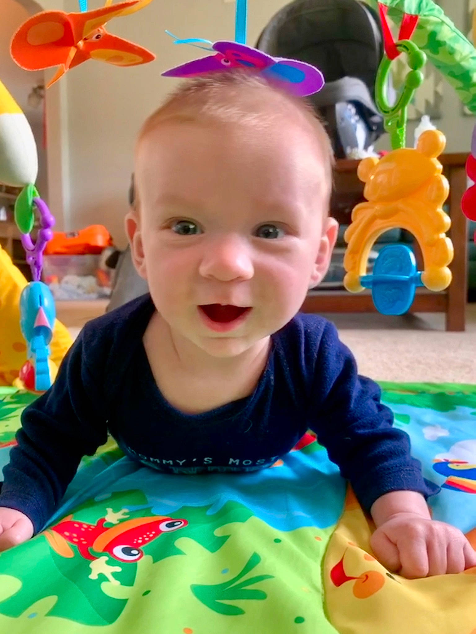 Elijah is registered to the contest to win money with this photo: baby, baby_playing_with_toys, baby_products, baby_toys, child, face, fun, happy, head, kindergarten, party, person, play, product, sitting, smile, toddler, toy, tummy_time