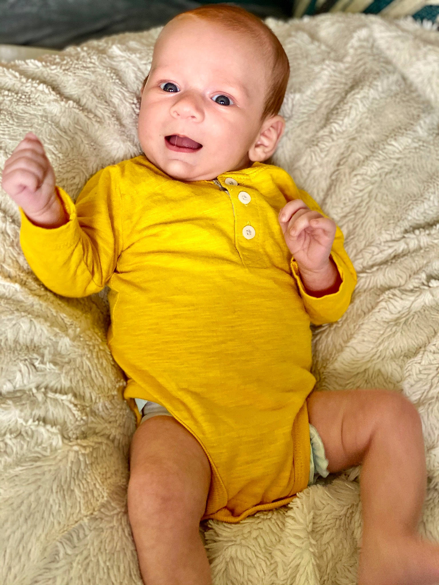 Elijah is registered to the contest to win money with this photo: baby, baby_toddler_clothing, child, person, sitting, skin, sleeve, smile, toddler, yellow