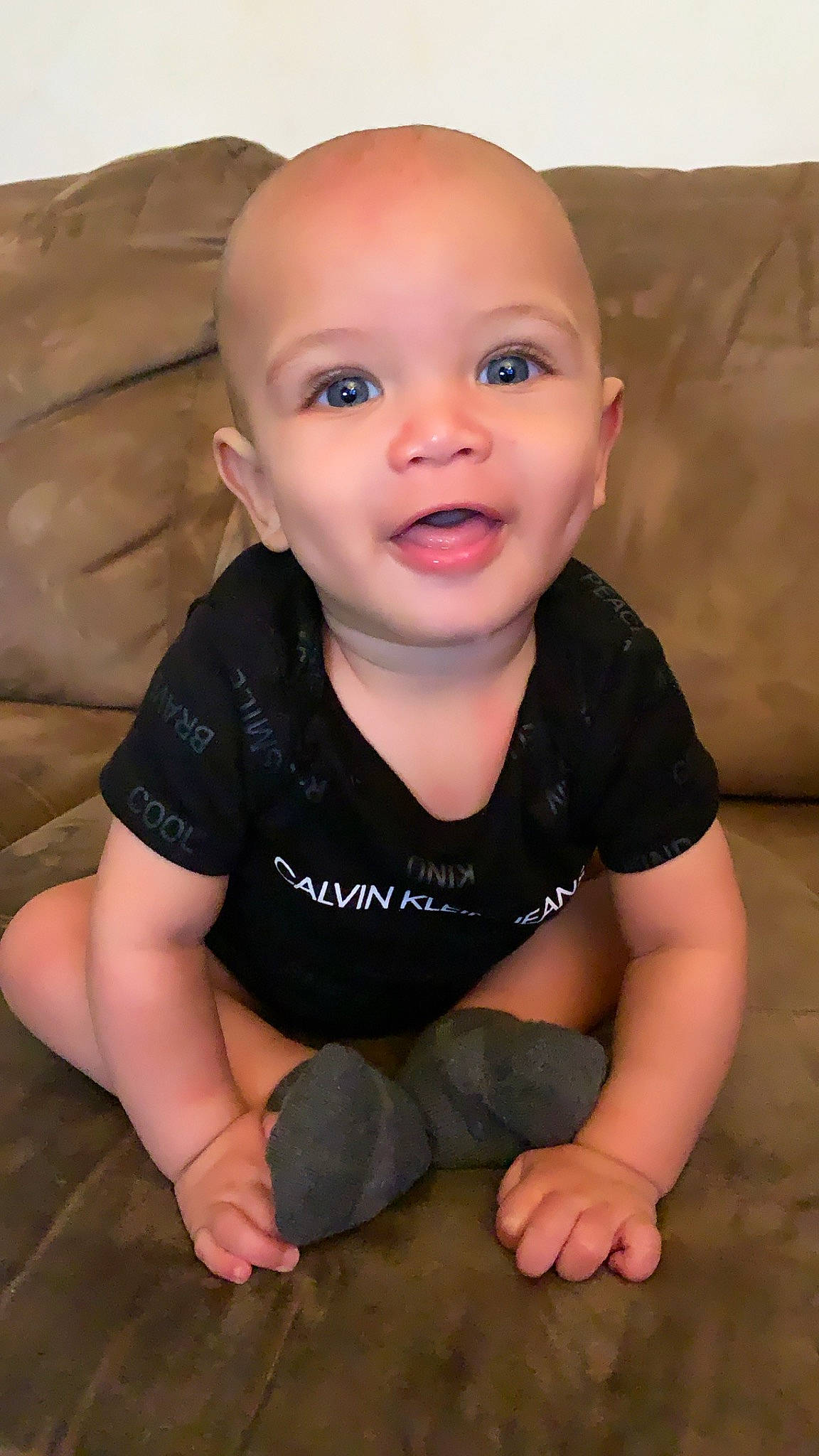 Royce is registered to the contest to win money with this photo: baby, baby_toddler_clothing, cheek, child, child_model, chin, crawling, face, head, lip, mouth, nose, person, portrait_photography, sitting, skin, smile, toddler