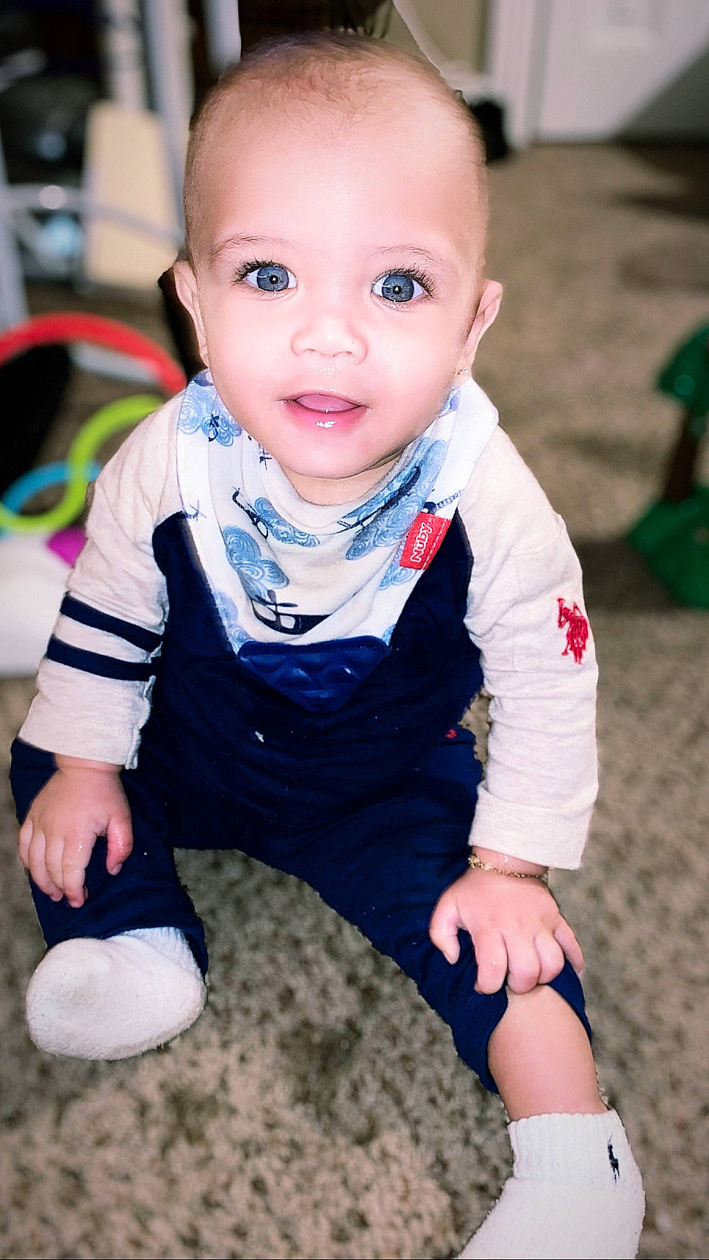 Royce is registered to the contest to win money with this photo: baby, baby_toddler_clothing, beauty, cheek, child, face, head, outerwear, person, play, sitting, skin, sleeve, smile, toddler