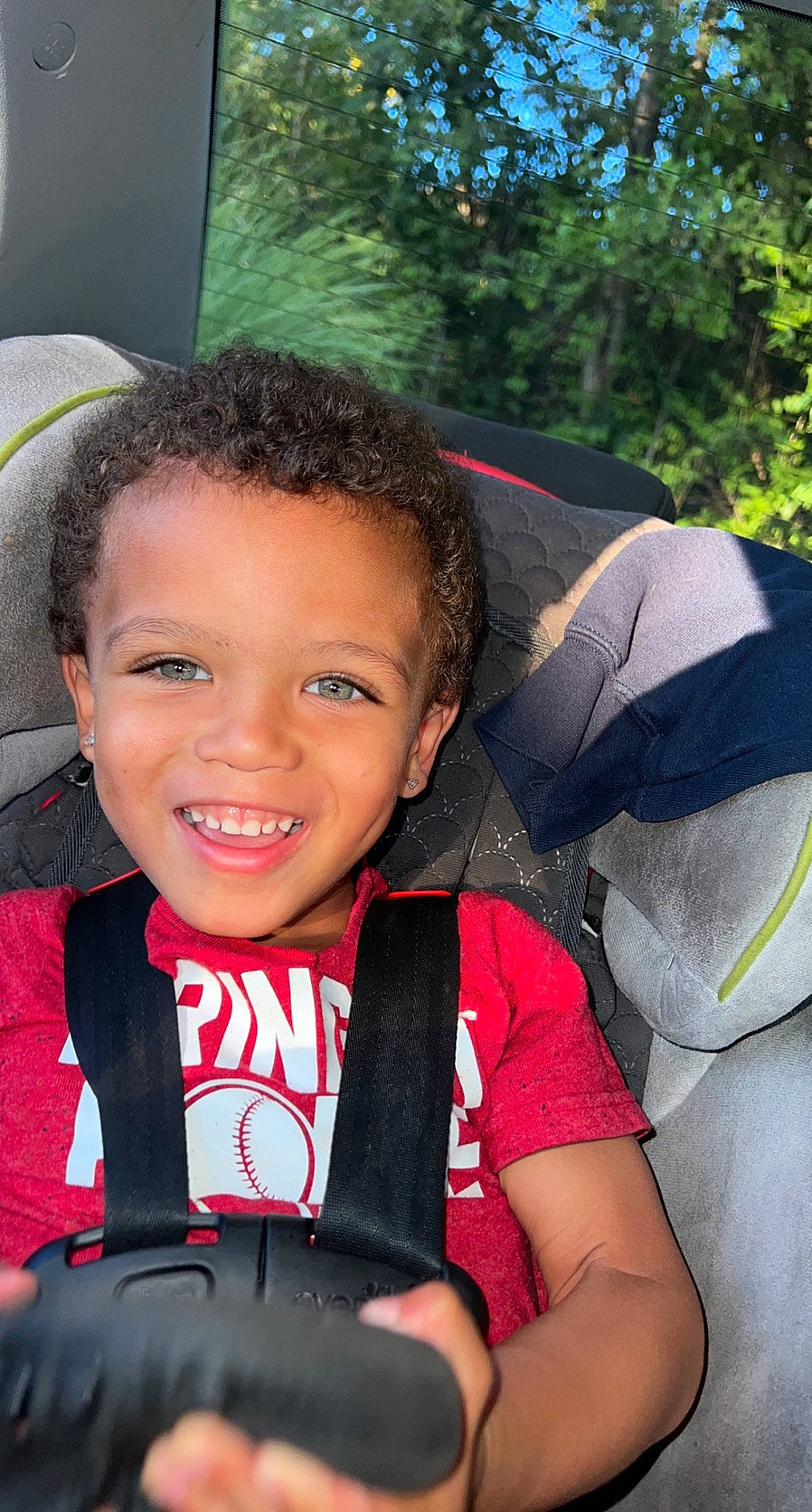 Royce joined the competition — help win amazing prizes! carmine, child, event, facial_expression, fun, hairstyle, happy, joy, leisure, lifejacket, person, personal_protective_equipment, recreation, sitting, skin, smile, t_shirt, toddler, travel, tree