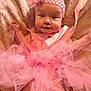 baby, pink, tutu, headband, flower, blanket, soft, cute, infant, tulle, clothing, portrait, smile, face, person, lying_down, child, fashion, texture, adorable