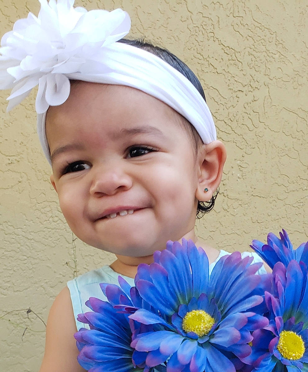 Nyla joined the competition — help win amazing prizes! azure, baby, baby_toddler_clothing, beauty, cap, close_up, electric_blue, eye, flower, happy, head, headband, headpiece, headwear, iris, joy, person, petal, plant, smile