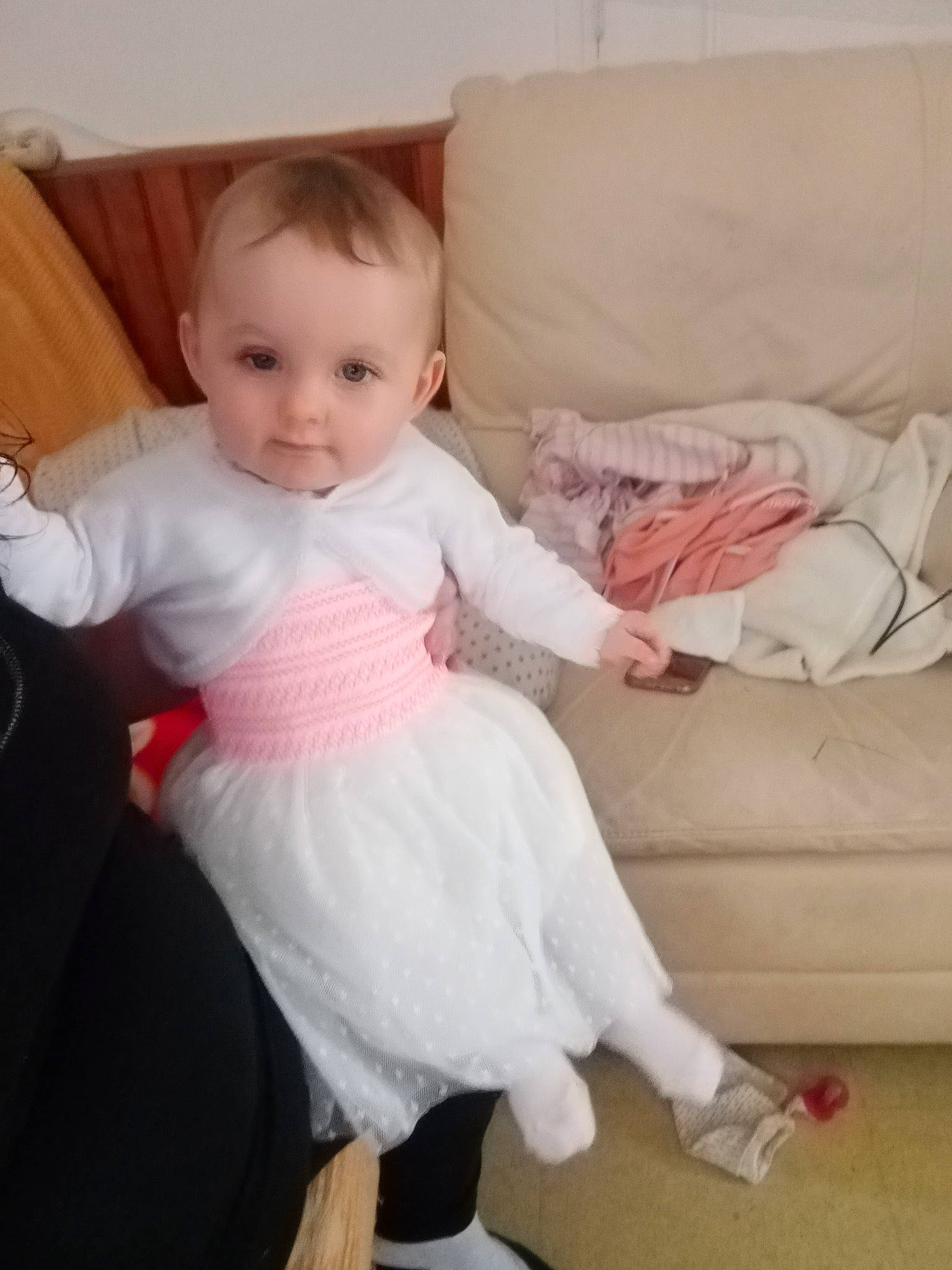 Léanna participe au concours pour gagner de l'argent avec cette photo : arm, baby, baby_toddler_clothing, beauty, cheek, child, dress, face, footwear, head, human, leg, person, pink, product, shoe, sitting, skin, sleeve, smile