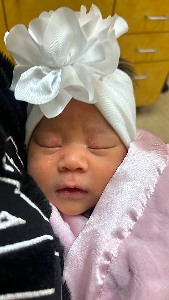 Esme joined the competition — help win amazing prizes! baby, baby_products, baby_sleeping, baby_toddler_clothing, cabinetry, cap, chest_of_drawers, child, comfort, cupboard, drawer, fashion_accessory, happy, headband, headgear, headpiece, headwear, linens, person, thumb