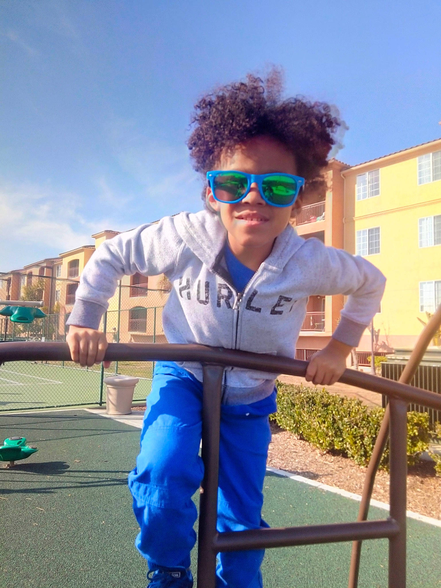 Bretton is registered to the contest to win money with this photo: cool, electric_blue, eyewear, fun, glasses, joy, person, sunglasses