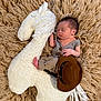 Houston joined the competition — help win amazing prizes! baby, child, cowboy_hat, cozy, cute_outfit, fur_rug, hat, indoors, infant, newborn, peaceful, plush_toy, portrait, resting, sleep, sleeping, small_person, soft_texture, stuffed_animal, toy_horse