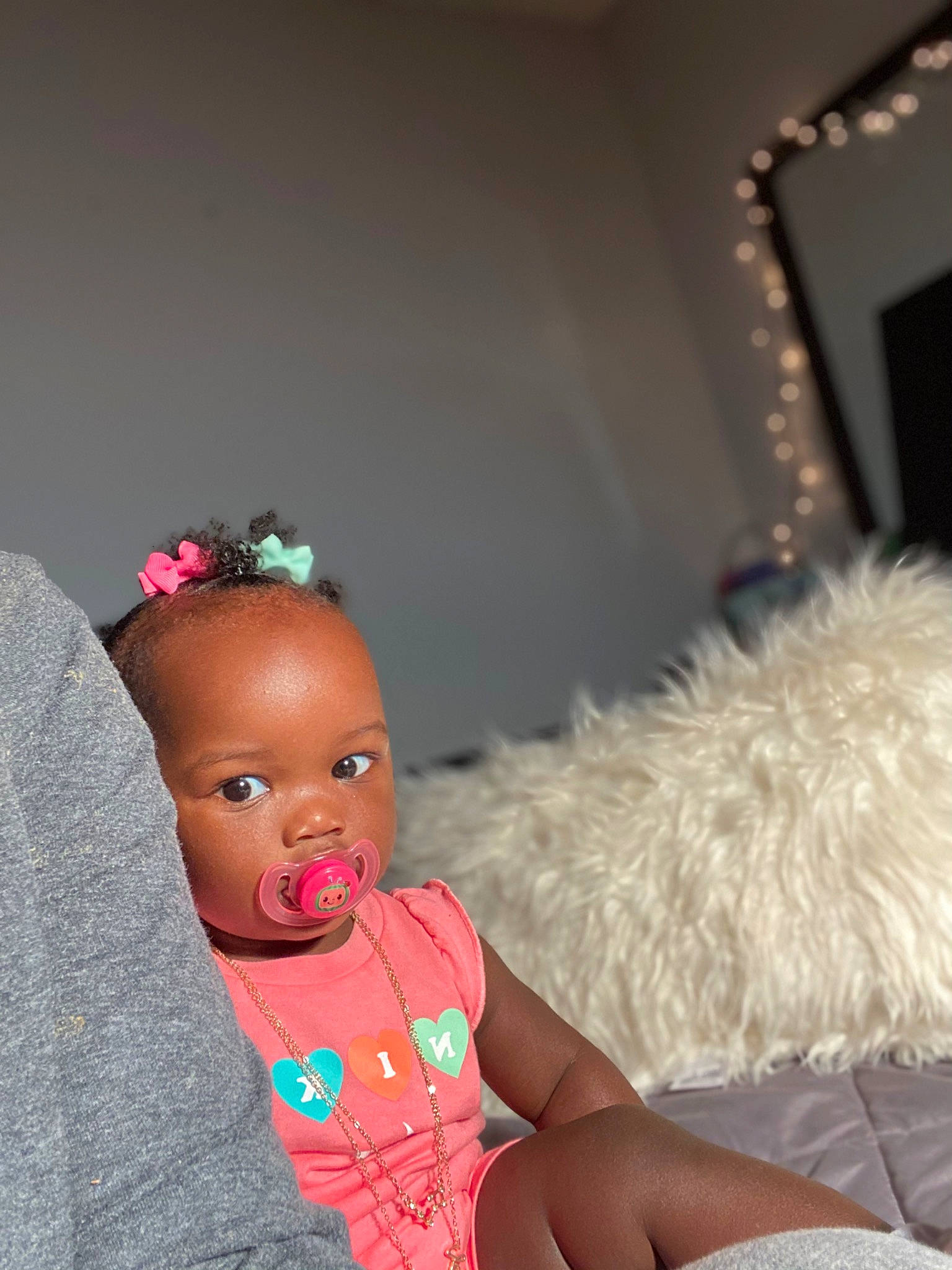 Alonni is registered to the contest to win money with this photo: baby, baby_products, baby_toddler_clothing, child, costume, couch, doll, event, fashion_accessory, fawn, headgear, iris, jewellery, magenta, nail, person, pink, room, sitting, toddler