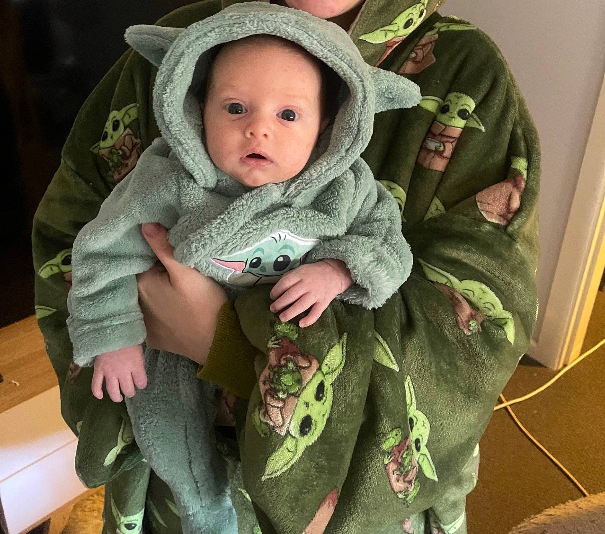 Billie joined the competition — help win amazing prizes! baby, baby_carriage, baby_products, baby_toddler_clothing, camouflage, cap, cheek, child, comfort, cool, fashion_accessory, grass, iris, lap, military_camouflage, pattern, person, sitting, skin, sleeve