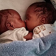 Williams joined the competition — help win amazing prizes! baby, newborn, sleeping, infant, cute, blanket, twin, closeup, face, sweet, peaceful, soft, cozy, child, portrait, love, family, rest, indoors, warm