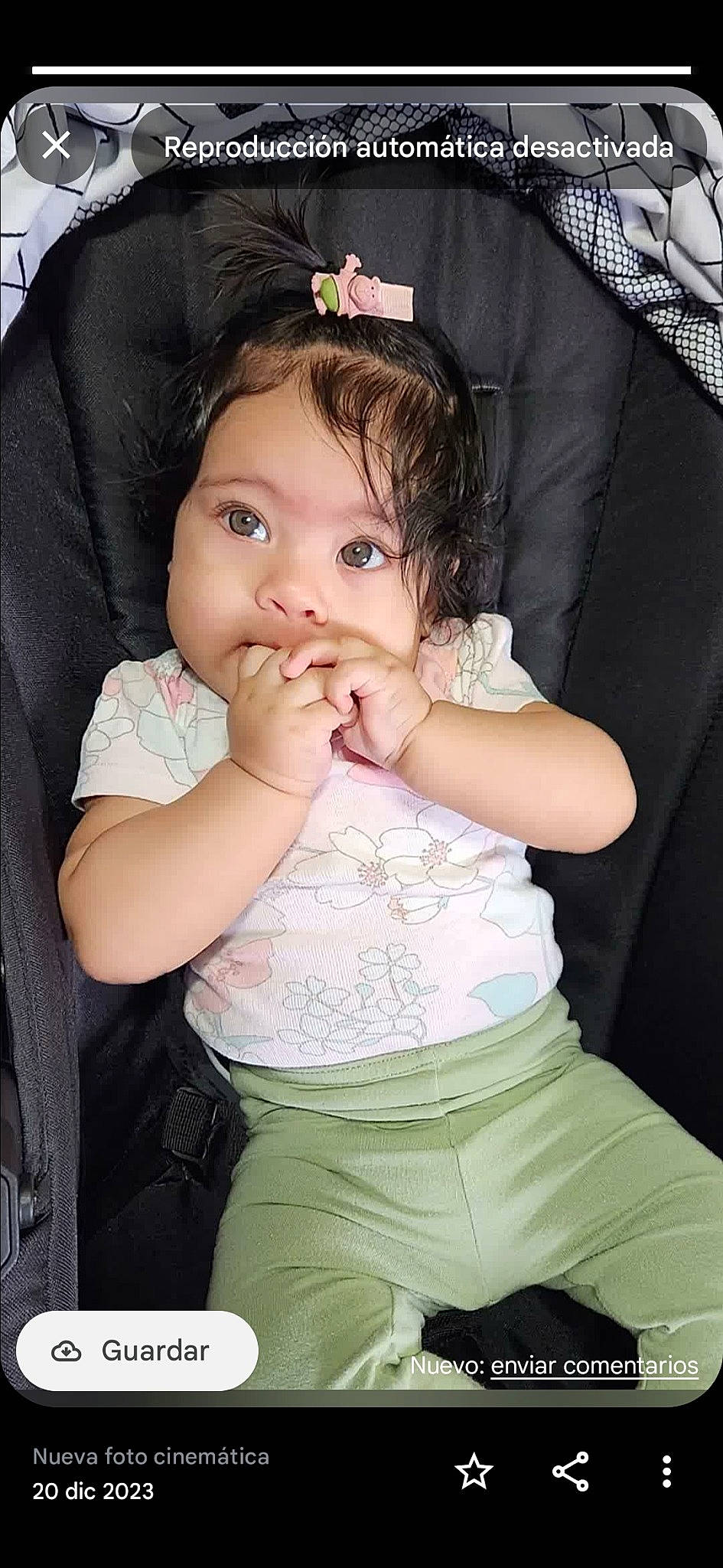 Alaia is registered to the contest to win money with this photo: arm, baby, baby_toddler_clothing, black, cheek, chin, eyelash, face, flash_photography, gesture, hair, happy, head, iris, lip, mouth, neck, nose, person, skin