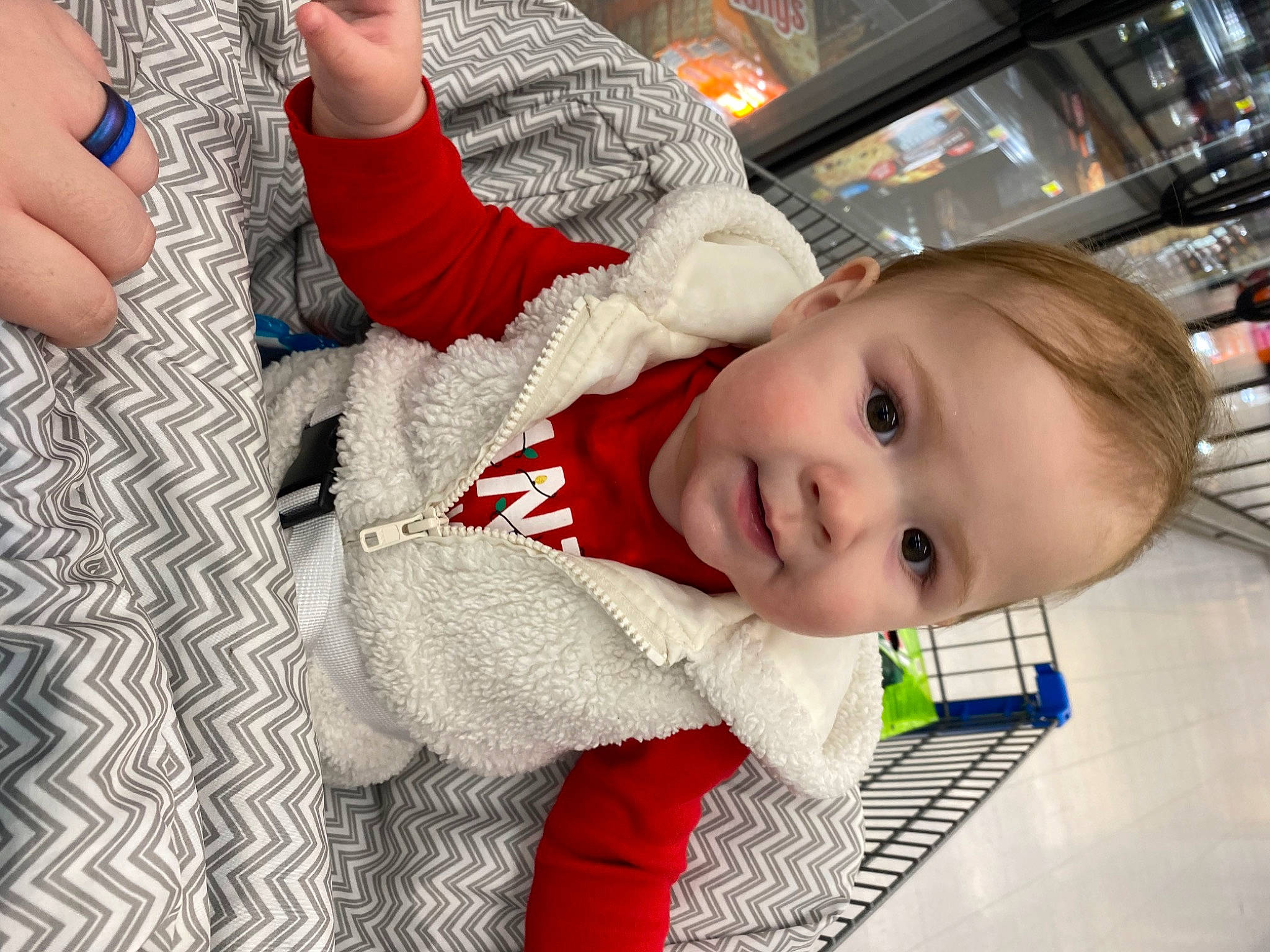 Blakelynn joined the competition — help win amazing prizes! baby, baby_toddler_clothing, carmine, cheek, child, flooring, fun, gesture, happy, human_leg, nail, pattern, person, plaid, sleeve, smile, textile, thumb, toddler, wood