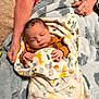 Zaiden joined the competition — help win amazing prizes! baby, sleeping, blanket, animal_print, hands, cozy, soft_texture, infant, resting, child, wrapped, warm, comfort, bed, toddler, pattern, clothing, person, nap, peaceful
