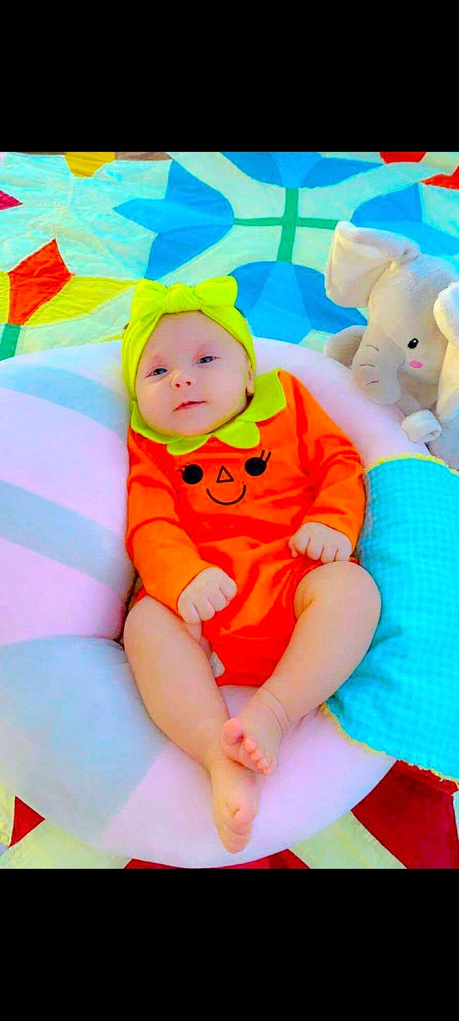 Raelee joined the competition — help win amazing prizes! baby, baby_products, child, headwear, orange, person, play, product, stuffed_toy, toddler, toy