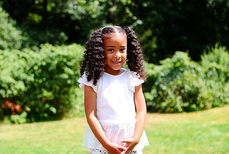 Nori is registered to the contest to win money with this photo: beauty, black_hair, botany, child, dress, fun, grass, hair, hairstyle, happy, joy, leisure, long_hair, people_in_nature, person, photograph, photography, shoulder, smile, spring