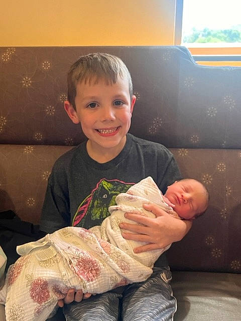 Trevor joined the competition — help win amazing prizes! baby, baby_toddler_clothing, cheek, child, comfort, couch, eye, face, finger, foot, fun, happy, joy, lap, person, sitting, skin, sleeve, smile, thumb