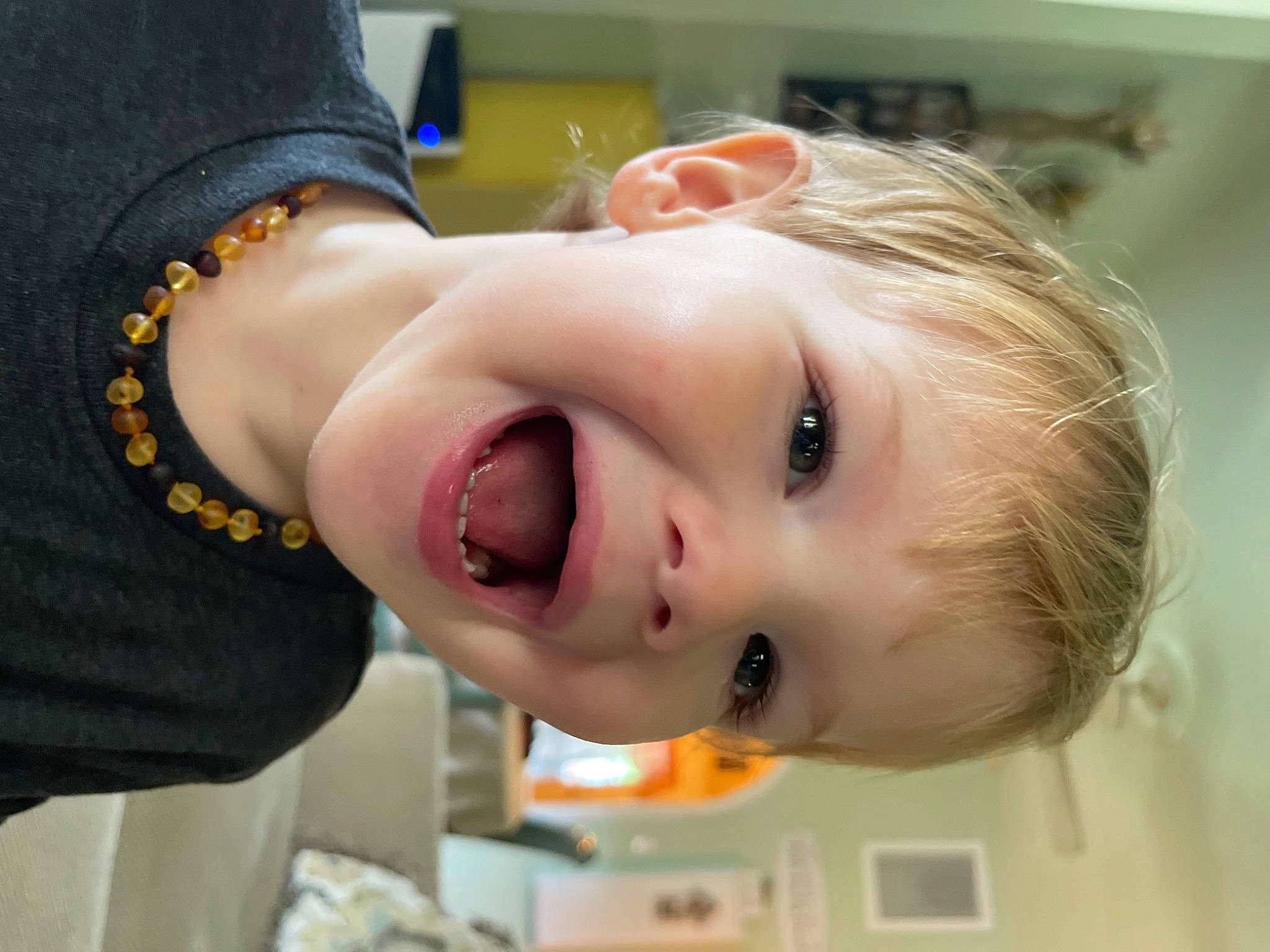 Truitt is registered to the contest to win money with this photo: blond, brown_hair, cheek, child, ear, eyelash, fashion_accessory, fun, gesture, hair_coloring, happy, iris, jaw, lip, neck, nose, person, sleeve, smile, throat