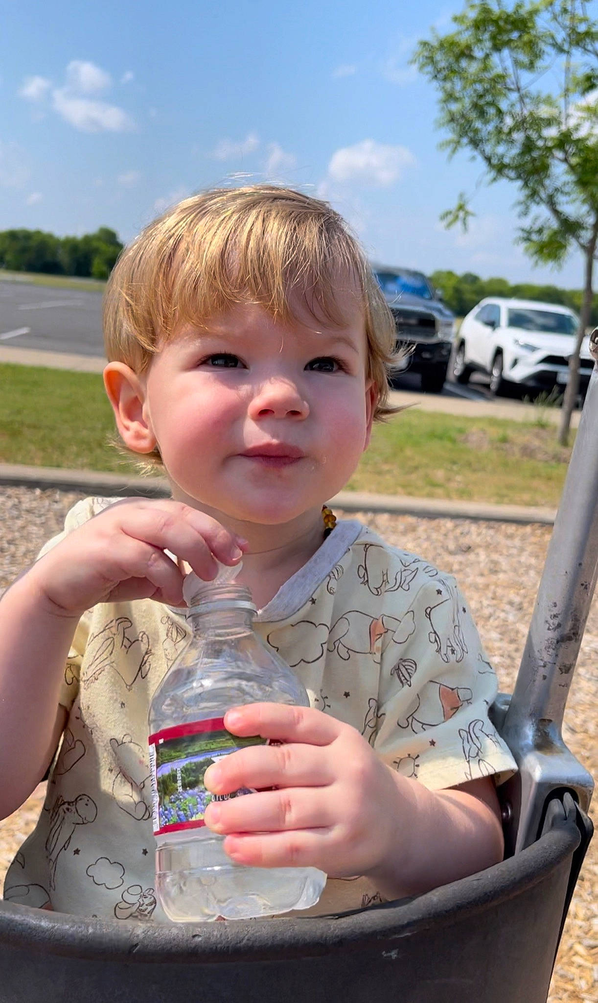Truitt joined the competition — help win amazing prizes! baby, blond, car, child, cloud, drinking, finger, fun, grass, hand, leisure, person, recreation, skin, sky, summer, toddler, tree, vehicle, water