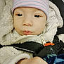Alexander joined the competition — help win amazing prizes! baby, blanket, car_seat, car_seat_harness, child, closeup, clothing, cute, expression, face, hat, indoor, infant, jacket, newborn, pale_skin, portrait, striped_hat, warm_clothing, white_jacket