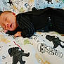 Alexander joined the competition — help win amazing prizes! baby, newborn, sleeping, blanket, cartoon, star_wars, darth_vader, yoda, stormtrooper, bed, clothing, infant, cute, indoors, child, resting, soft, pattern, black_outfit, peaceful