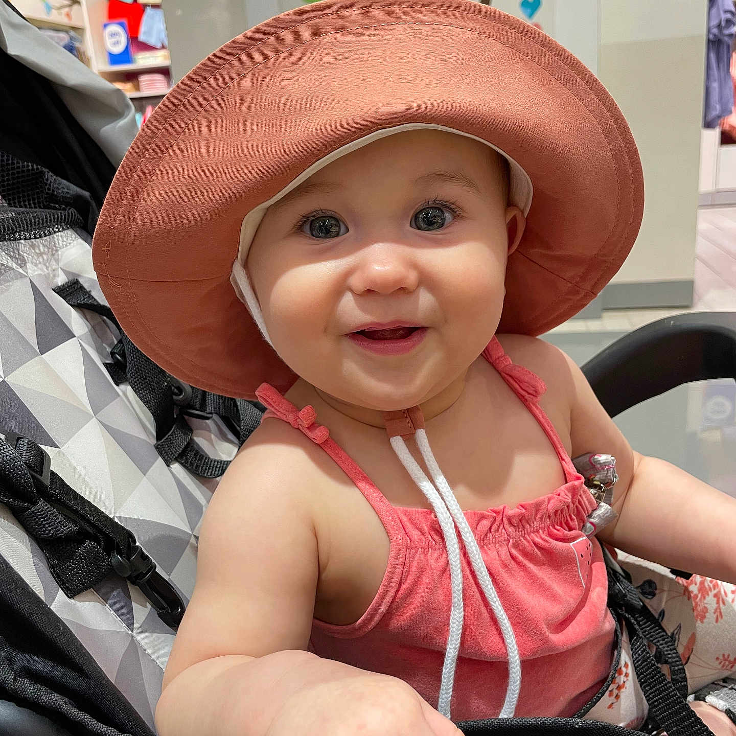 Sanya joined the competition — help win amazing prizes! accessories, baby, bonnet, cap, clothing, costume, dress, face, happy, hat, head, jewelry, necklace, person, photography, portrait, sitting, smile, stroller, sunhat
