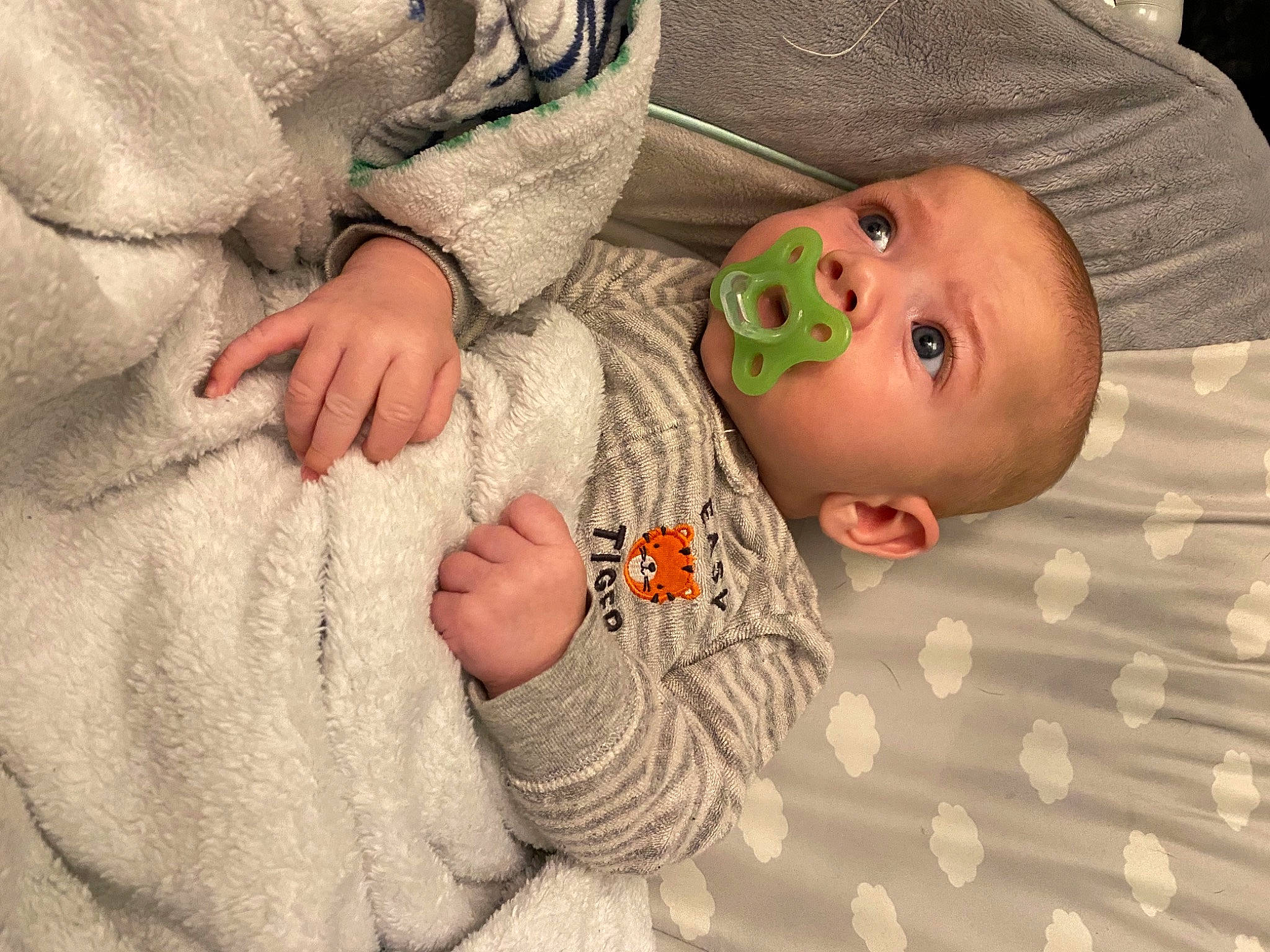 Xavier Bennett is registered to the contest to win money with this photo: baby, baby_products, baby_safety, baby_toddler_clothing, cheek, child, comfort, fun, gesture, grass, happy, iris, linens, mouth, nose, pattern, person, skin, sleeve, thumb