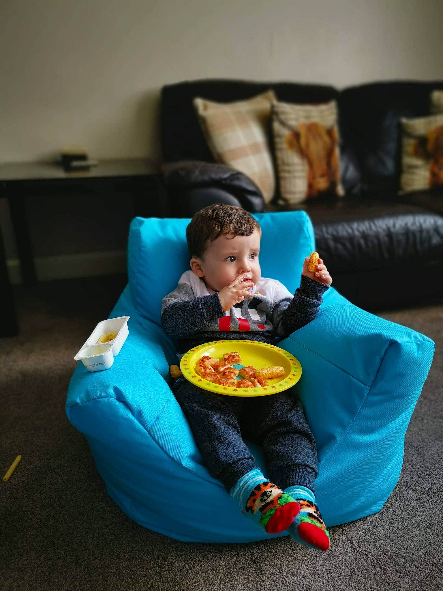 Callan is registered to the contest to win money with this photo: breakfast, child, cuisine, dish, eating, food, furniture, junk_food, lunch, meal, person, play, sitting, table, tableware, toddler