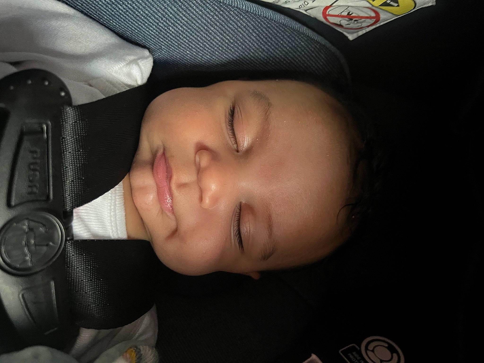 Randall is registered to the contest to win money with this photo: audio_equipment, baby, baby_products, baby_toddler_clothing, car_seat, cheek, child, chin, comfort, ear, eyebrow, eyelash, flash_photography, fun, headgear, lip, nose, person, skin, smile