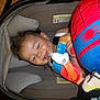 Grayson joined the competition — help win amazing prizes! baby, car_seat, plush_toy, spiderman, mickey_mouse, child, smiling, indoor, wooden_floor, cute, infant, toy, seat, person, happy, cozy, childcare, portrait, colorful, comfort