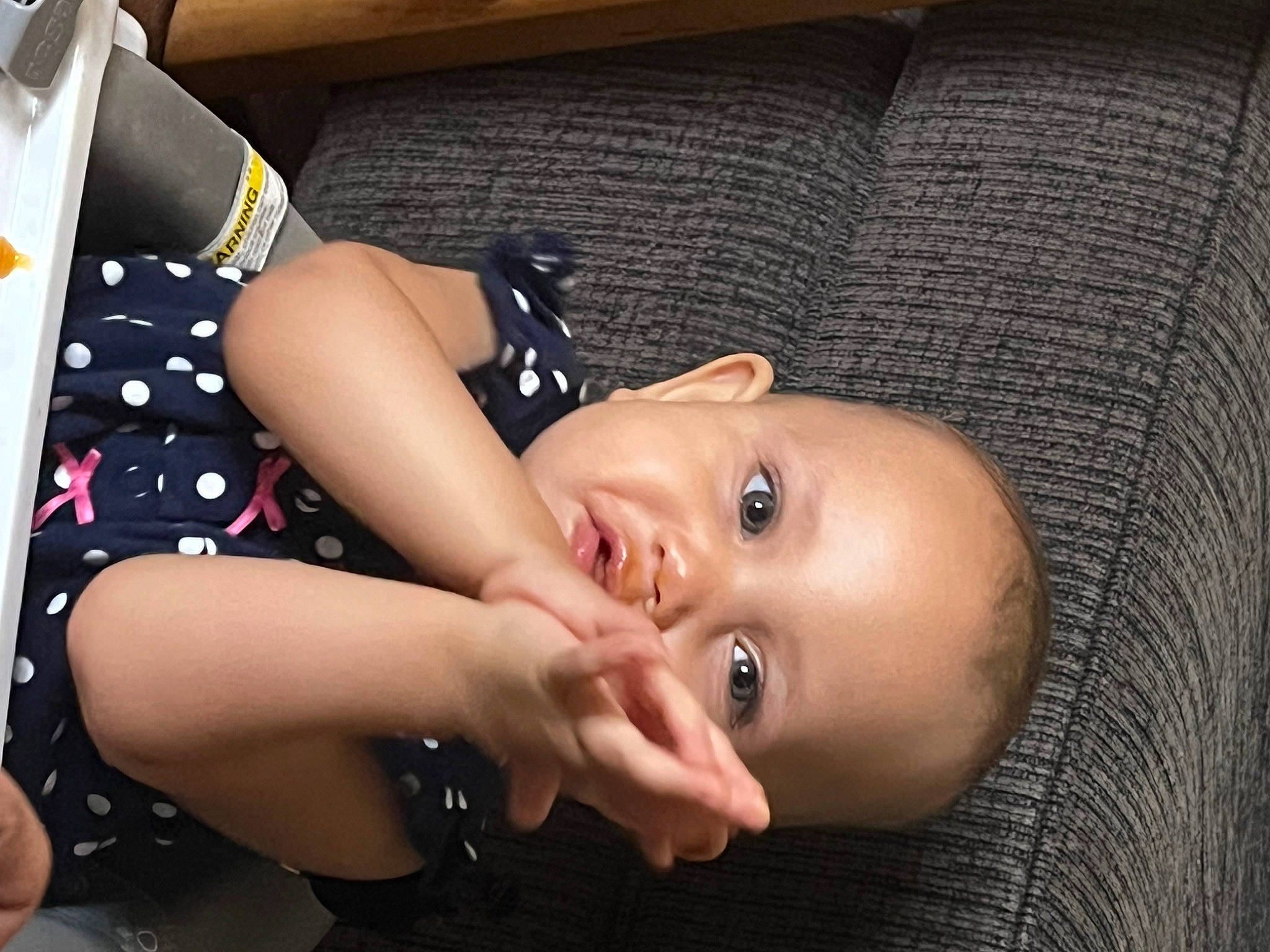 Savaile is registered to the contest to win money with this photo: black_hair, cheek, chest, comfort, cool, elbow, eyelash, finger, flash_photography, hat, human_leg, lip, mouth, neck, nose, person, skin, thigh, toddler, trunk