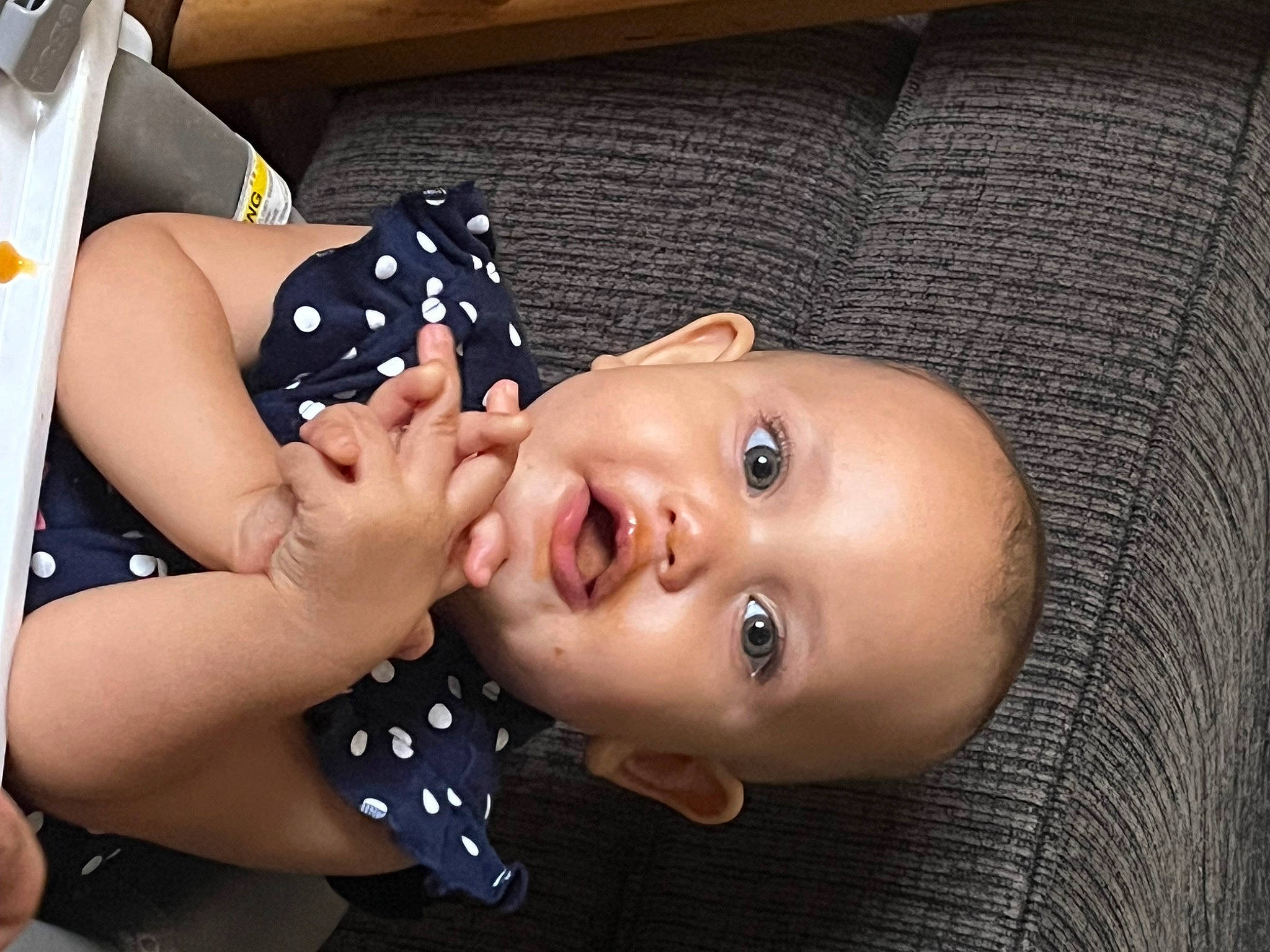 Savaile is registered to the contest to win money with this photo: baby, black_hair, cheek, child, eyelash, fashion_accessory, fun, gesture, happy, lip, nail, neck, nose, pattern, person, skin, thumb, toddler, toy, wood