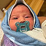 Carmen participe au concours pour gagner de l'argent avec cette photo : baby, blanket, child, closeup, cute, eyes, face, head, indoors, infant, mouth, newborn, newborn_baby, pacifier, person, skin, sleepwear, soft, towel, wrapped