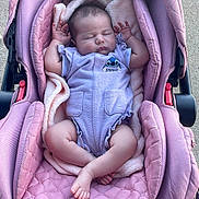 Carmen participe au concours pour gagner de l'argent avec cette photo : baby, blanket, car_seat, child, clothing, comfort, cute, infant, newborn, peaceful, person, pink, purple, relax, resting, sleep, sleeping, soft, stitch, toddler