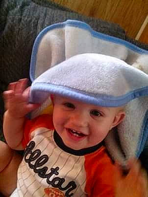 Kaleb is registered to the contest to win money with this photo: baby, baby_laughing, baby_toddler_clothing, bonnet, cheek, child, comfort, costume_accessory, costume_hat, finger, headgear, headwear, joy, laugh, nail, person, pleased, product, skin, sleeve