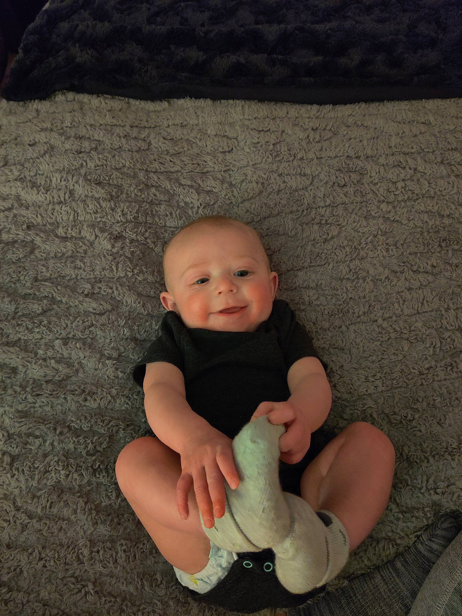 Tatum joined the competition — help win amazing prizes! arm, baby, child, finger, hand, leg, person, sitting, skin, smile, toddler, vacation