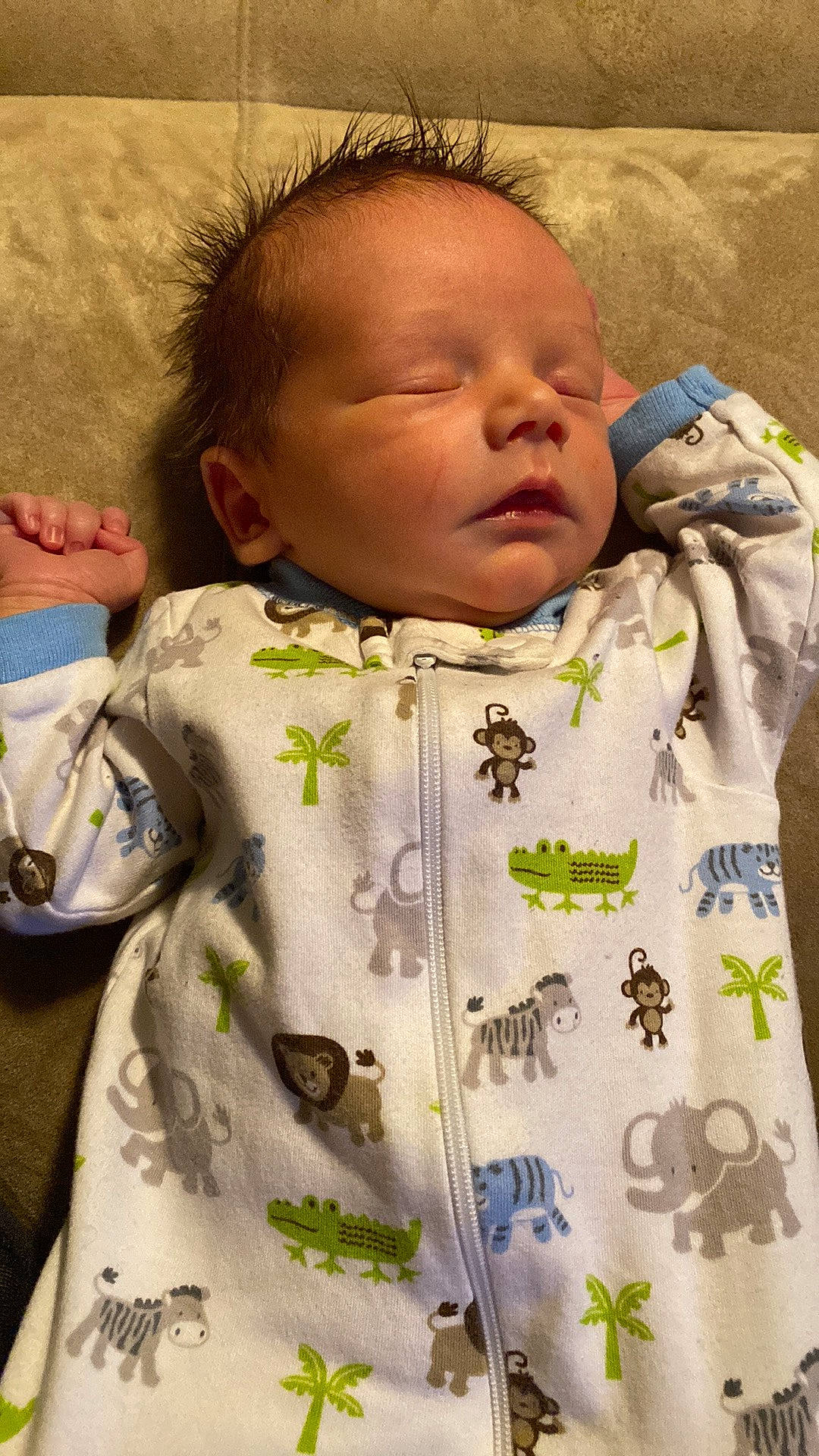 Phoenix is registered to the contest to win money with this photo: baby, baby_toddler_clothing, cheek, child, comfort, face, facial_expression, grass, happy, head, human, neck, nose, person, skin, sleeve, t_shirt, textile, toddler, white