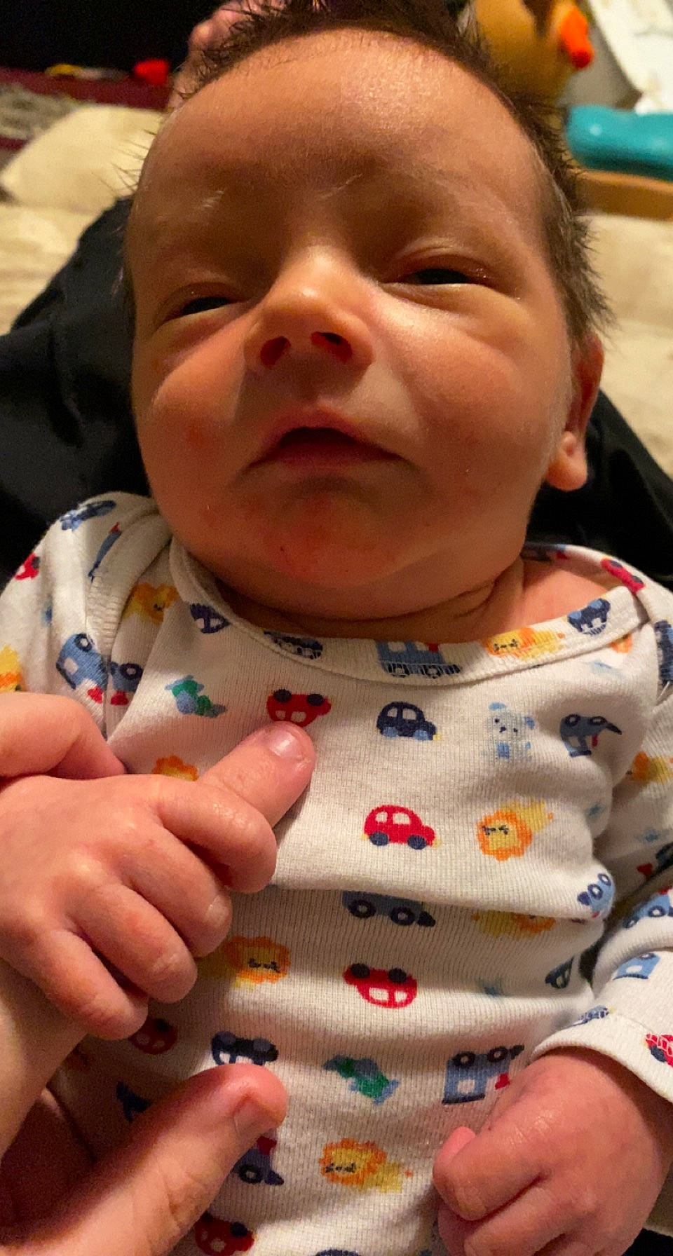 Phoenix is registered to the contest to win money with this photo: baby, baby_toddler_clothing, cheek, chin, eye, eyebrow, eyelash, facial_expression, finger, forehead, gesture, human, iris, lip, mouth, neck, nose, person, skin, sleeve