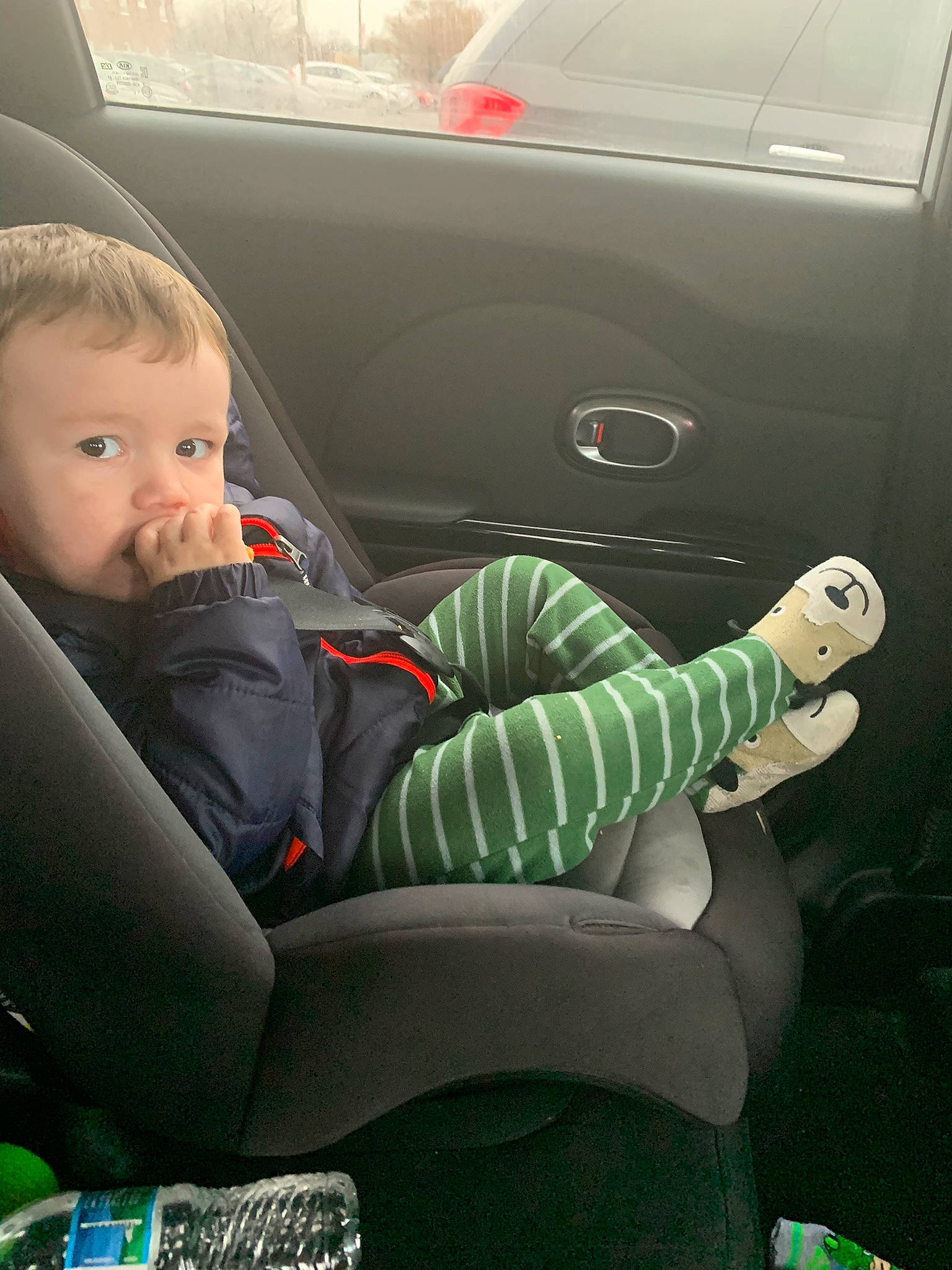 Johnathan is registered to the contest to win money with this photo: auto_part, automotive_design, automotive_exterior, car_seat, car_seat_cover, child, comfort, finger, green, hairstyle, lap, motor_vehicle, person, personal_luxury_car, product, snapshot, thigh, toddler, vehicle, vehicle_door