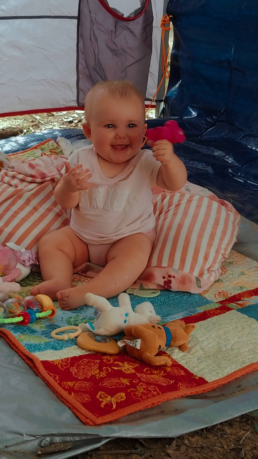 Gracelyn is registered to the contest to win money with this photo: baby, baby_products, baby_toddler_clothing, cheek, chest, child, diaper, face, foot, fun, happy, head, joy, leisure, mouth, person, pink, play, skin, smile