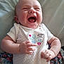 Isabelle is registered to the contest to win money with this photo: baby, laughing, infant, onesie, cute, happy, smiling, child, portrait, indoors, clothing, person, skin, face, hand, young, cactus, fabric, bed, cozy