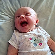 Isabelle joined the competition — help win amazing prizes! baby, infant, smiling, laughing, onesie, cactus, embroidery, clothing, lying_down, happy, cute, child, soft_light, skin, cheerful, indoors, portrait, baby_girl, baby_boy, infant_clothing