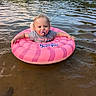 Phoenixx joined the competition — help win amazing prizes! baby, child, cute, floating, greenery, inflatable_ring, lake, nature, outdoor, pacifier, pink, playful, recreation, smiling, summer, sunlight, swimming, toddler, trees, water