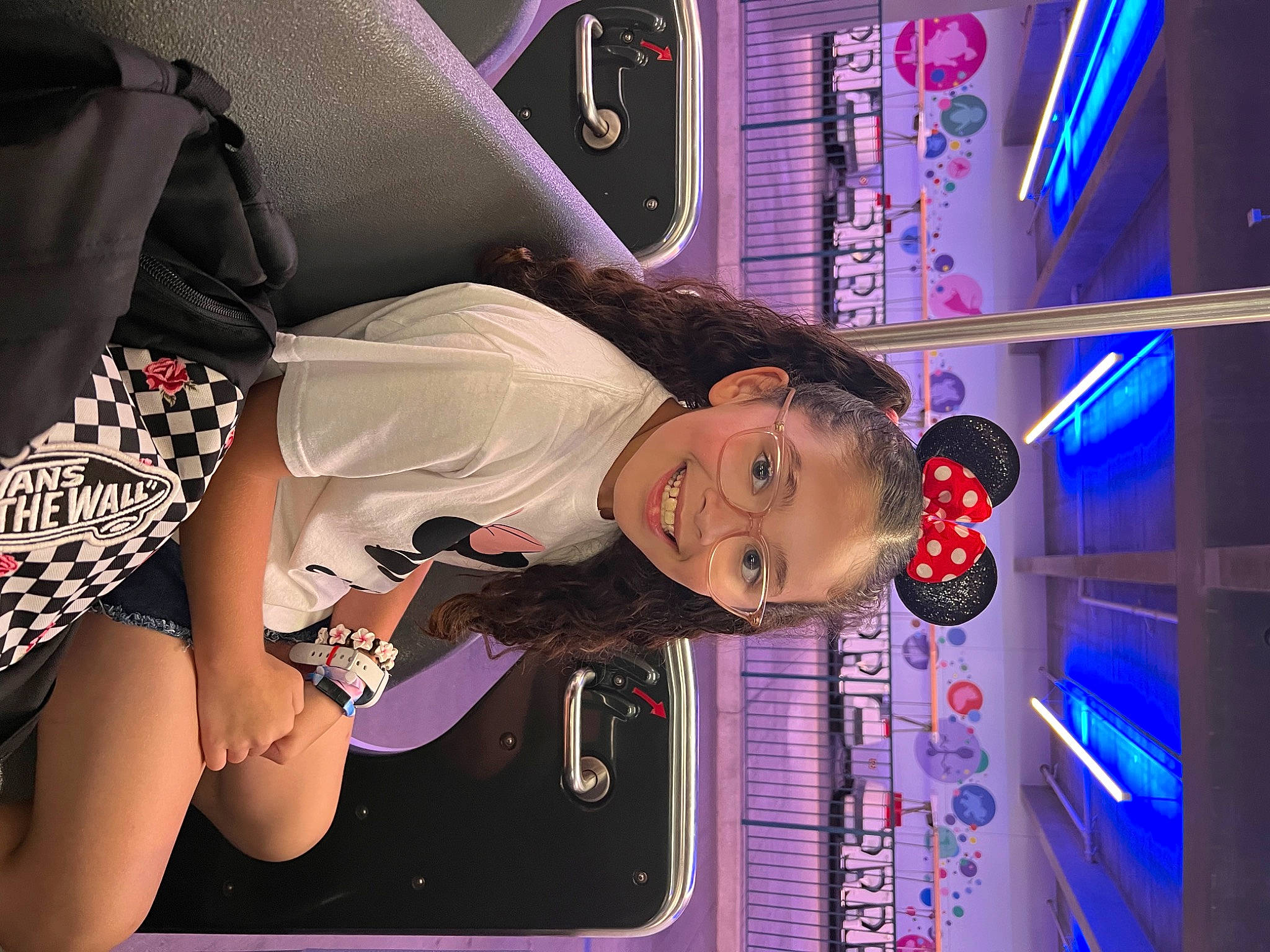 Sofia joined the competition — help win amazing prizes! audio_equipment, entertainment, event, eyewear, fun, games, jewellery, joy, machine, magenta, neon, person, purple, room, smile, visual_effect_lighting