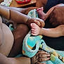 Adonyze joined the competition — help win amazing prizes! baby, infant, arm, hand, foot, skin, blanket, fingers, toes, soft_texture, closeup, toddler, cuddle, child, body_part, colorful, warm, indoor, touch, family