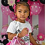 child, toddler, birthday, pink, tutu, braids, beads, purse, balloons, party, celebration, white_shirt, decorations, polka_dots, smile, cute, portrait, indoor, fashion, happy
