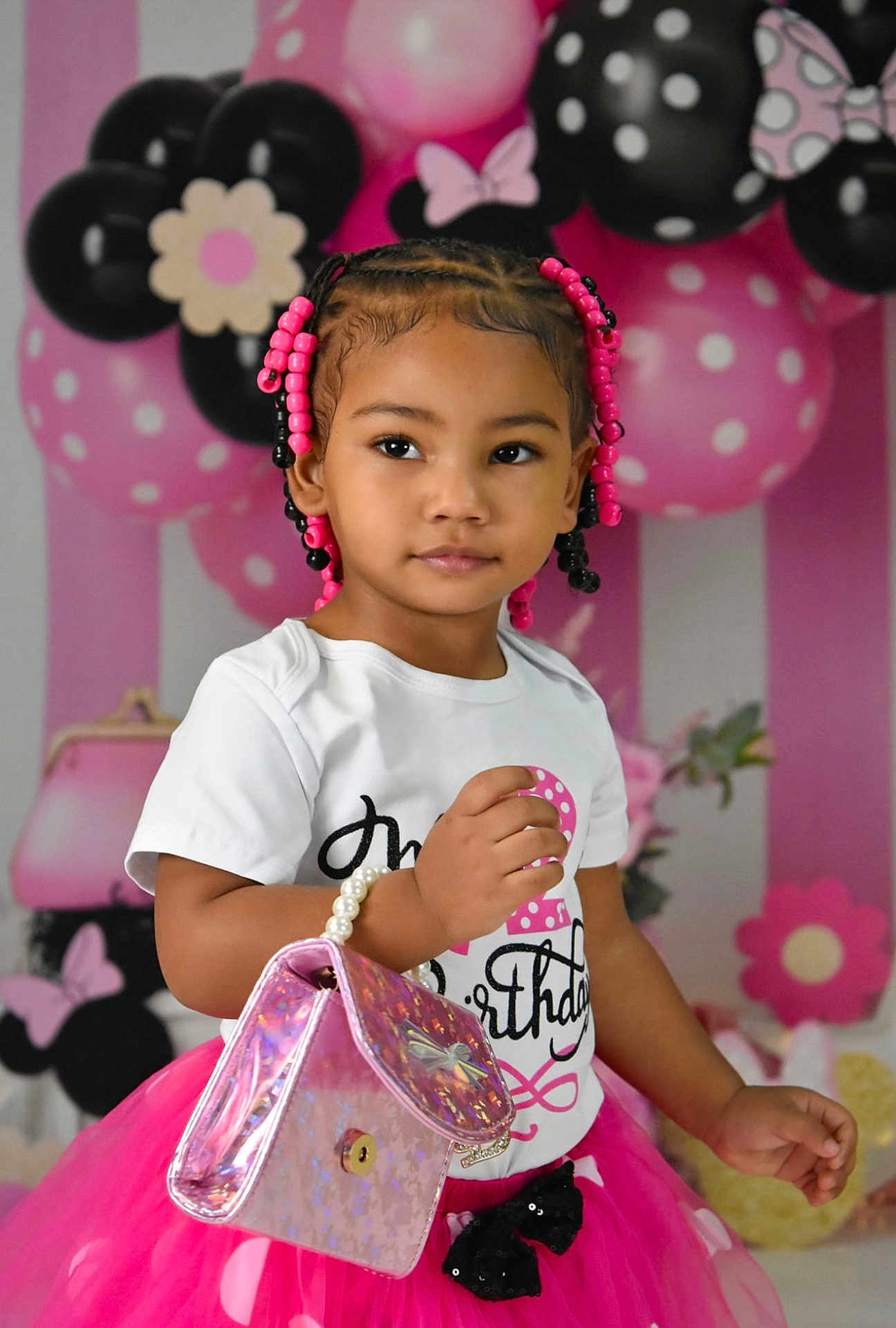 Tyaisia joined the competition — help win amazing prizes! child, toddler, birthday, pink, tutu, braids, beads, purse, balloons, party, celebration, white_shirt, decorations, polka_dots, smile, cute, portrait, indoor, fashion, happy
