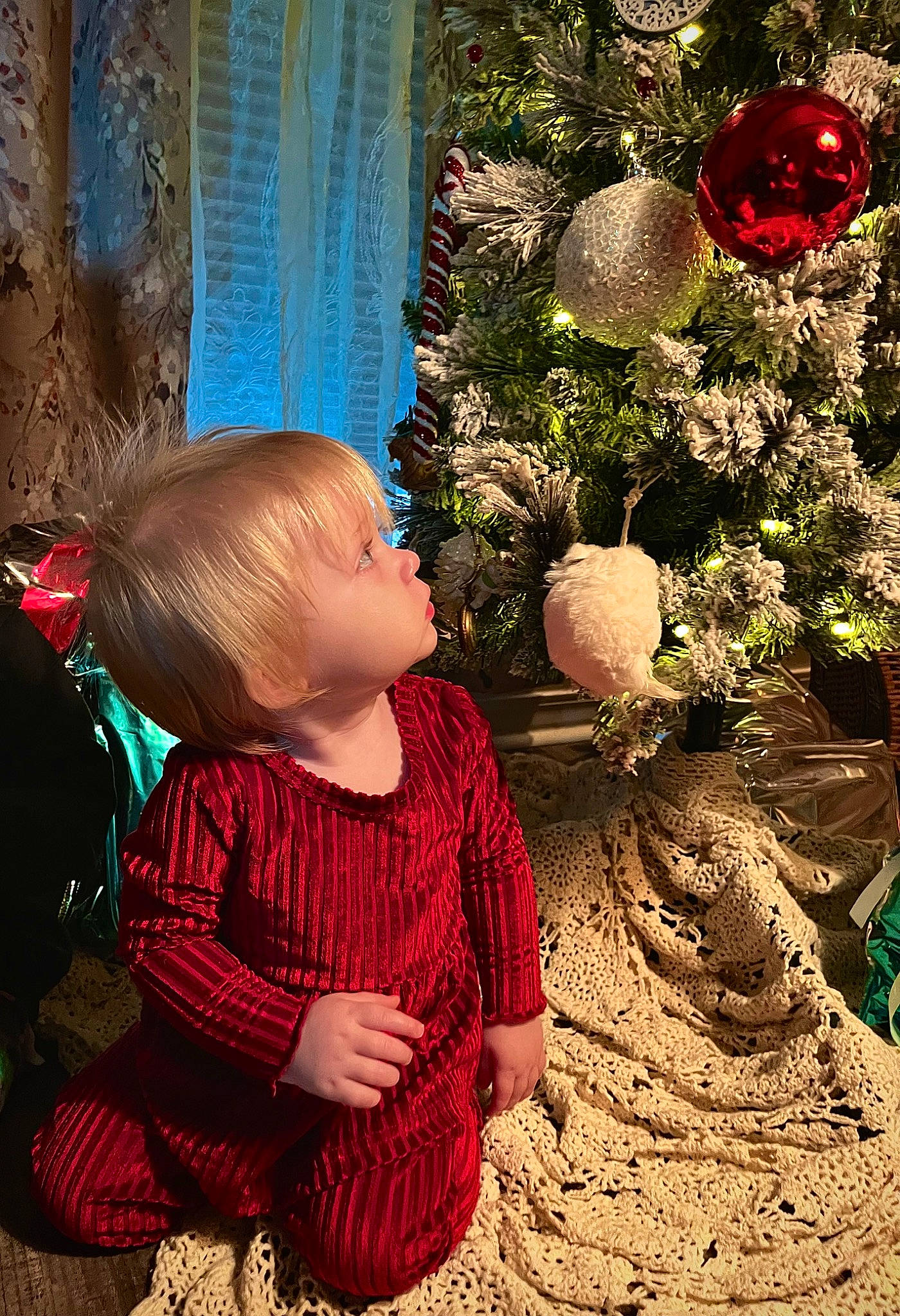 Lillian is registered to the contest to win money with this photo: baby, baby_toddler_clothing, beauty, child, christmas_decoration, christmas_ornament, event, fun, grass, happy, leaf, magenta, people_in_nature, person, pink, plant, standing, temple, toddler, tree