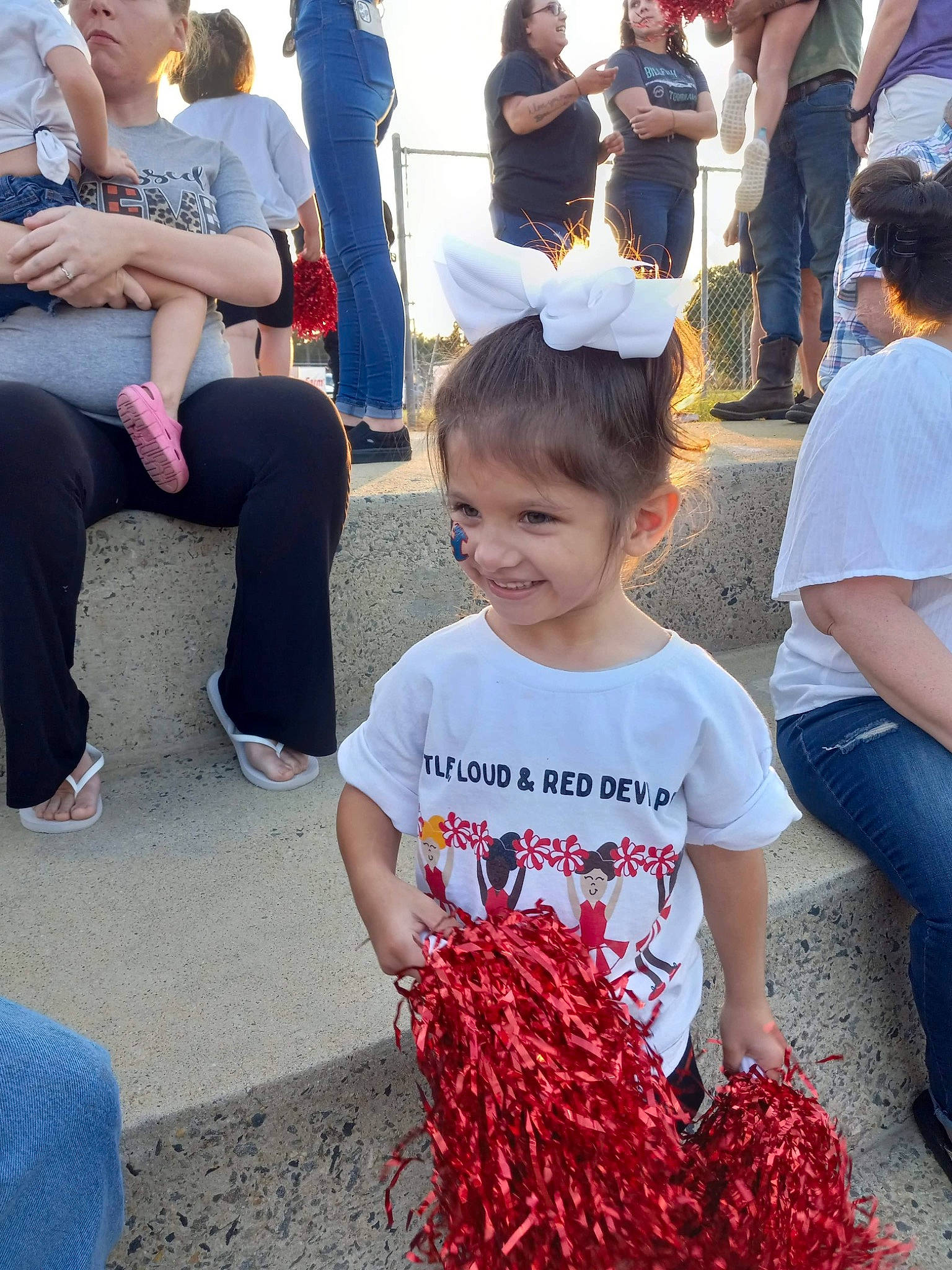 Adilynn Walker is registered to the contest to win money with this photo: blue, child, clothing, event, fun, hairstyle, happy, hat, human_settlement, joy, leisure, mammal, person, photograph, public_space, shoe, shorts, snapshot, t_shirt, vegetable