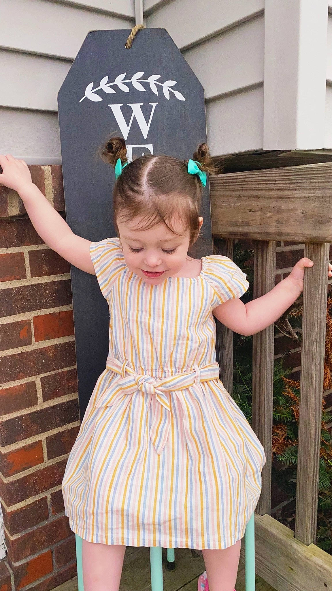 Kynsleigh is registered to the contest to win money with this photo: baby_toddler_clothing, beauty, child, clothing, day_dress, dress, facial_expression, fashion, hairstyle, human_body, joy, organ, person, pink, product, sleeve, standing, t_shirt, textile, toddler