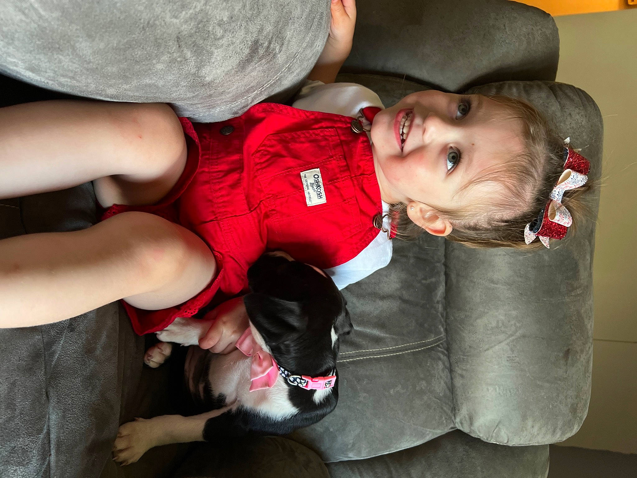 Kynsleigh is registered to the contest to win money with this photo: baby, baby_products, baby_toddler_clothing, cap, carmine, child, comfort, elbow, event, fun, happy, head, headgear, joy, lap, mouth, person, red, sitting, textile